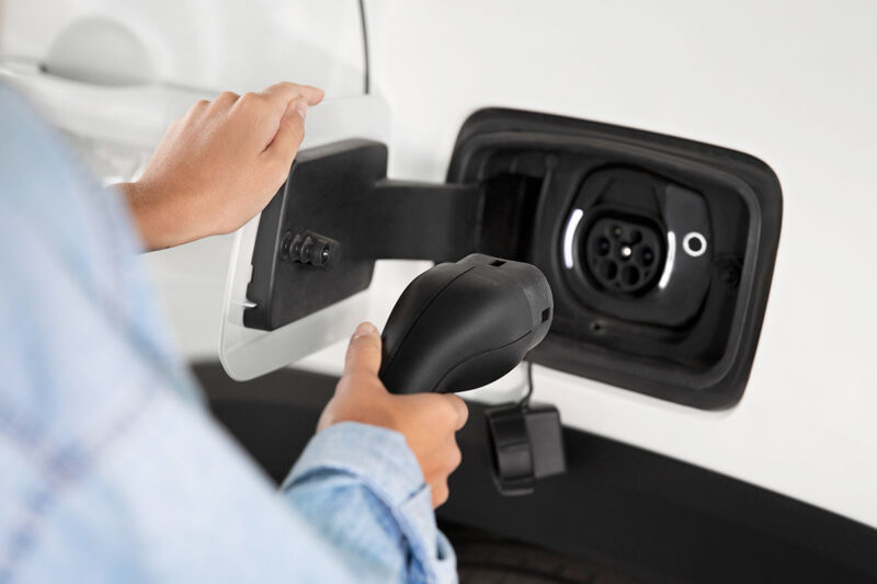 plugging in an electric car