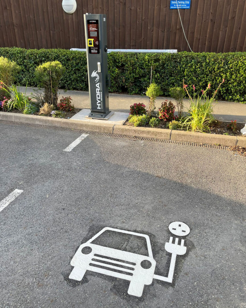 Hydra Genesis with contactless payment terminal with 2 ev parking spaces